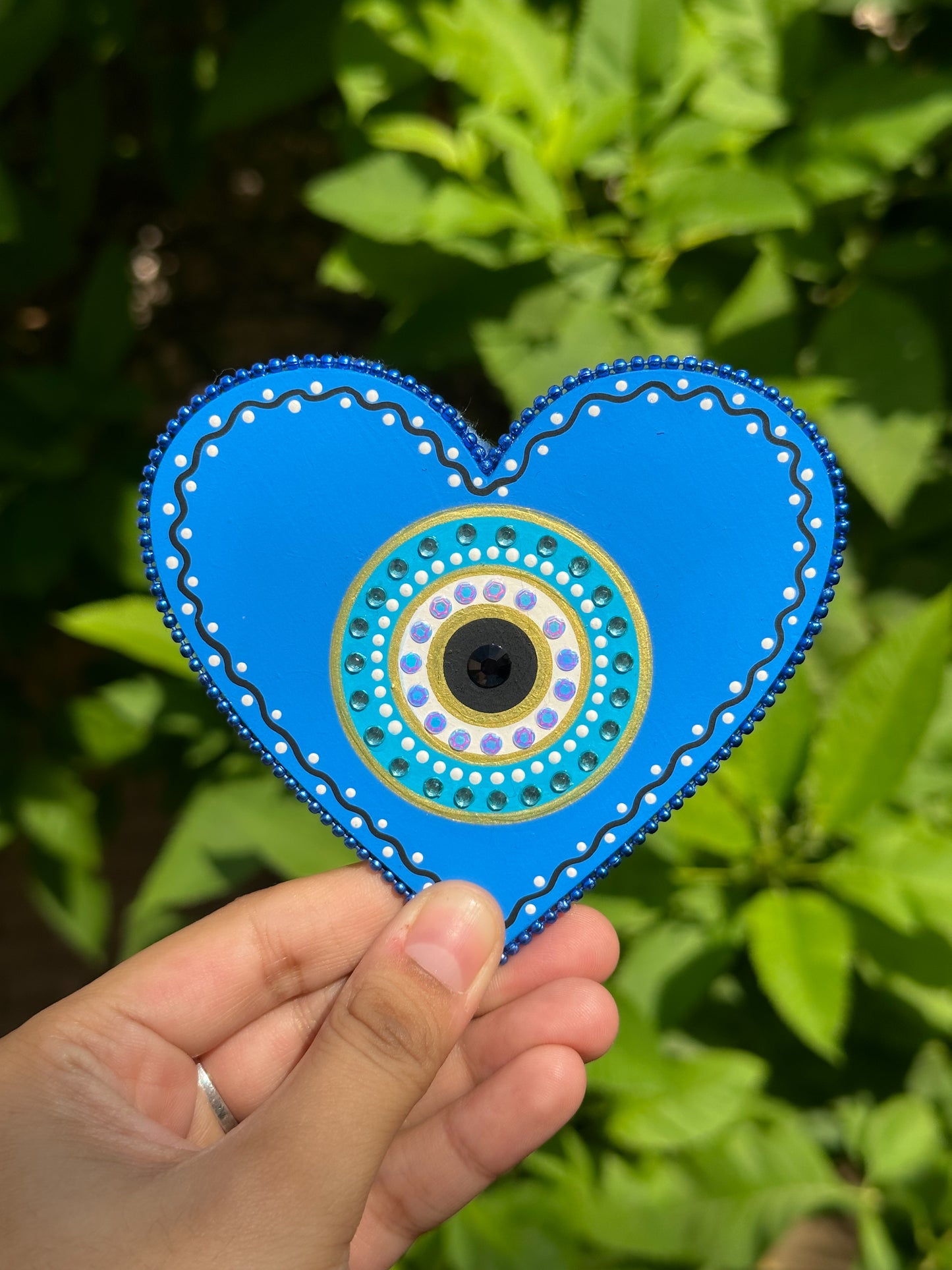 EVIL EYE FRIDGE MAGNET