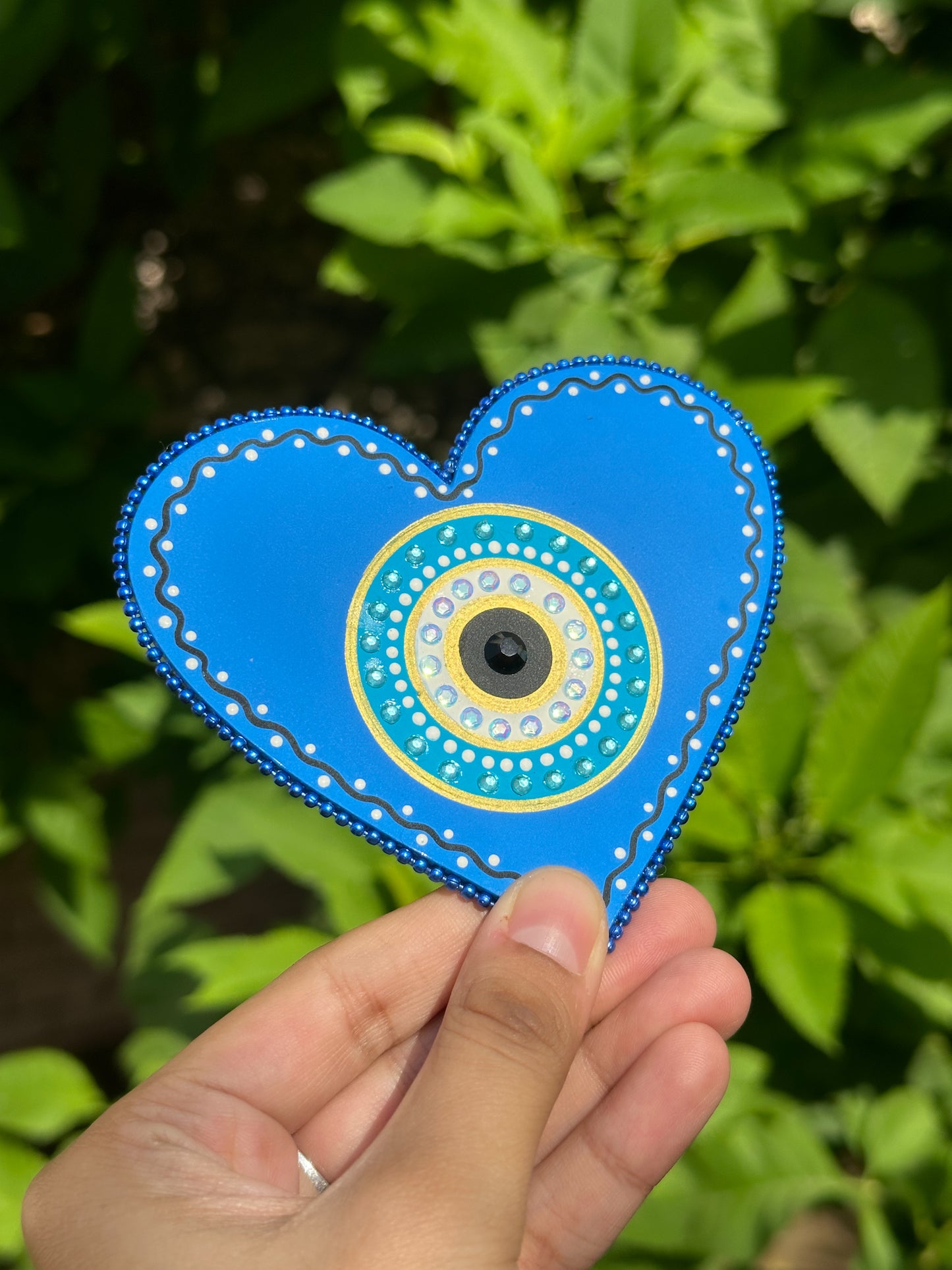 EVIL EYE FRIDGE MAGNET